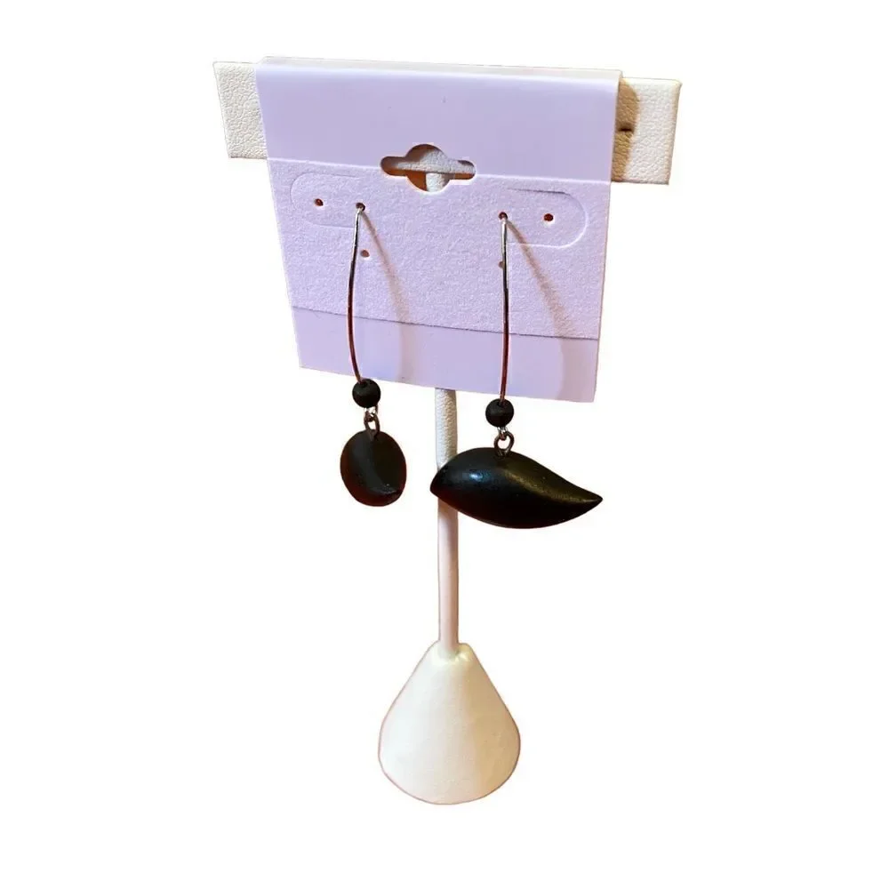 Simple Black bird wood earrings on thin silver toned wire. Very pretty